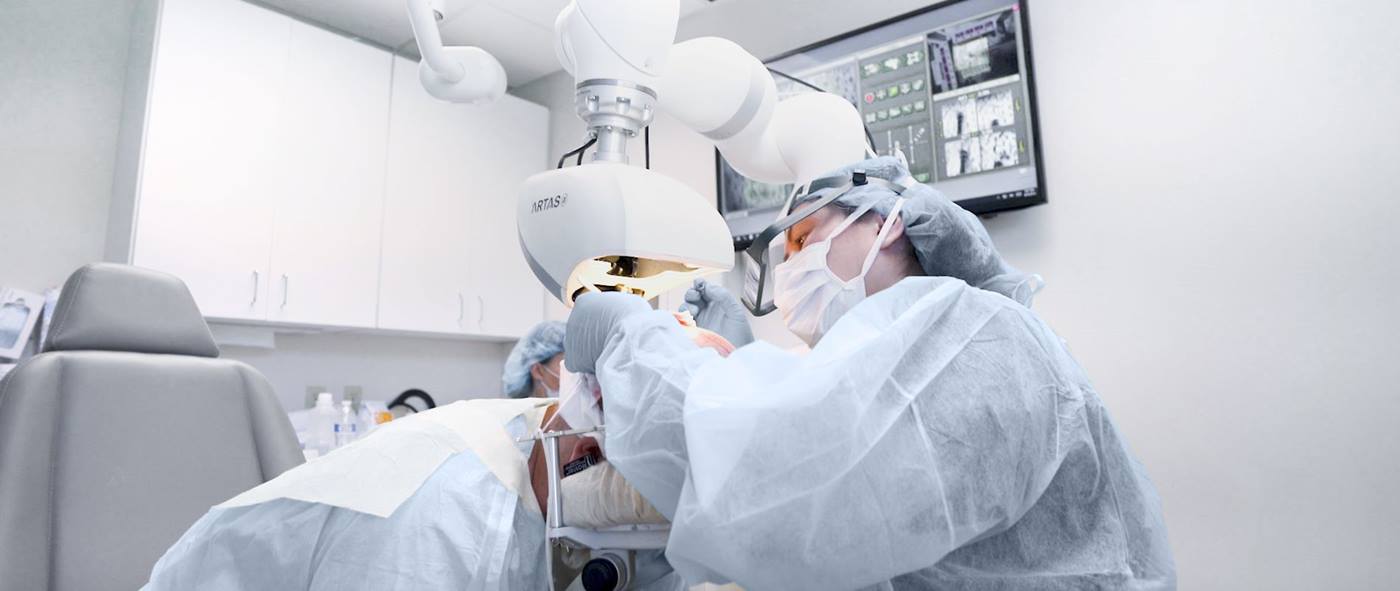 Surgeon is assisted by LBR Med Cobot robot during hair transplant surgery
